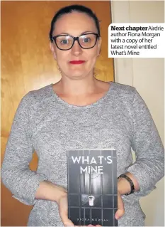  ??  ?? Next chapter Airdrie author Fiona Morgan with a copy of her latest novel entitled What’s Mine