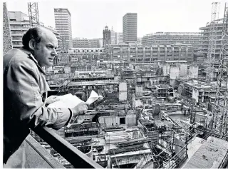  ??  ?? Henry Wrong overseeing constructi­on work on the Barbican arts centre: he thought it ‘the ugliest building in the world’