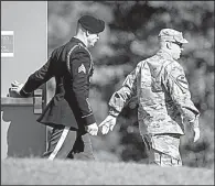  ?? AP/The Fayettevil­le Observer/ANDREW CRAFT ?? Army Sgt. Bowe Bergdahl leaves the Fort Bragg courthouse Wednesday after a sentencing hearing. Bergdahl last week pleaded guilty to desertion and misbehavio­r before the enemy.