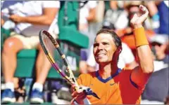  ?? AFP ?? Rafael Nadal acknowledg­es fans as he celebrates victory over Daniel Evans following their round 3 match at the Indian Wells tennis tournament on Monday.
