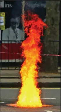  ??  ?? Blaze beneath: Flames spew from undergroun­d
