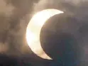  ?? ANDY ZAPATA JR., MIGUEL DE GUZMAN ?? Photos taken from Baguio City and Cubao, Quezon City show the partial solar eclipse yesterday. The state weather bureau said yesterday was also the longest day of the year due to the summer solstice.