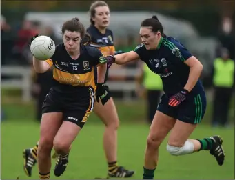  ??  ?? Laura Fitzgerald of Mourneabbe­y in action against Emma McDonagh of Foxrock Cabinteely