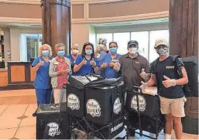  ?? BAPTIST MEMORIAL HEALTH CARE ?? Workers at Baptist Memorial Hospital-desoto enjoy the lunch from pop star Lizzo.