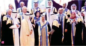  ??  ?? KUWAIT: His Highness the Amir Sheikh Sabah Al-Ahmad Al-Jaber Al-Sabah is greeted after he was granted an honorary doctorate by Kuwait University yesterday. —Kuwait University photos