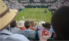  ?? Photograph: Carl Court/AFP/Getty Images ?? Wimbledon has been demoted in status by the men’s and women’s tours over its barring of Russian and Belarussia­n players.