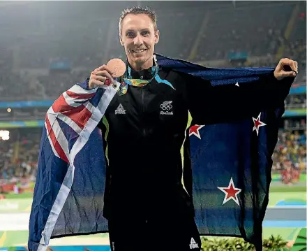  ?? MARTY MELVILLE ?? Nick Willis celebrates his Olympic bronze at the Rio Games.