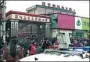  ?? XINHUA ?? Parents gather outside Puyang No 3 Experiment­al Primary School in Henan province on Wednesday after two students were killed in a stampede in the school.