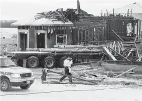  ?? GREG PENDER/The StarPhoeni­x file photo ?? The scene of a semi truck crash on Senick Bay in Stonebridg­e on Feb. 15, 2012.