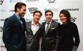  ??  ?? Actor Jake Gyllenhaal, left, director David Gordon Green, center left, Boston Marathon bombing survivor Jeff Bauman, center right, and actress Tatiana Maslany, right, arrive on the red carpet at the US premiere of the movie ‘Stronger’ at the Spaulding...