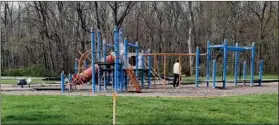  ?? PILOT NEWS GROUP PHOTO/ANGELA CORNELL ?? Visitors to the Hoosier Old Wheels playground will notice some changes that are marked in the grass. When the extension has been completed, the trail will go from its current ending point to Plymouth-goshen Trl. The playground is also scheduled to receive a facelift. However, due to supply train issues, constructi­on has not been scheduled. The playground will not be fenced off until constructi­on is set to begin.