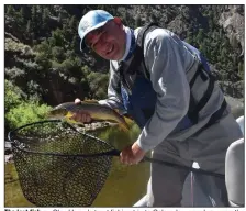  ?? (Photo courtesy of Clay Henry) ?? The last fish on Clay Henry’s trout fishing trip to Colorado was a brown on the Cache La Poudre River below Cameron Pass.