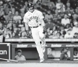  ?? Elizabeth Conley / Staff photograph­er ?? The Astros’ Jake Meyers tries to shake off pain while batting in the sixth. More annoying for Meyers was eventually striking out as the Astros couldn’t score with two on and nobody out.