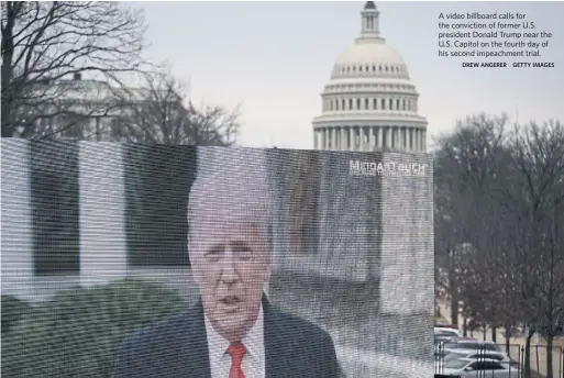  ?? DREW ANGERER GETTY IMAGES ?? A video billboard calls for the conviction of former U.S. president Donald Trump near the U.S. Capitol on the fourth day of his second impeachmen­t trial.