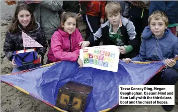  ??  ?? Tessa Conroy Ring, Megan Geogheghan, Caelum Hind and Sam Lally with the third class boat and the chest of hopes.