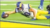  ?? Wally Skalij Los Angeles Times ?? COOPER KUPP comes up short of the end zone on this dive, but did score on a long pass in the opener.