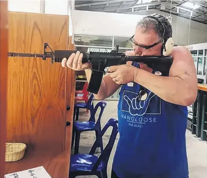  ?? PHOTO: THE NEW ZEALAND HERALD ?? ‘‘Research’’ . . . Government Minister Shane Jones shoots an AR15 gun — banned in New Zealand — in Thailand.