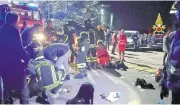  ??  ?? SAVING LIVES: Rescuers assist injured people outside a nightclub in Corinaldo, central Italy, early yesterday.