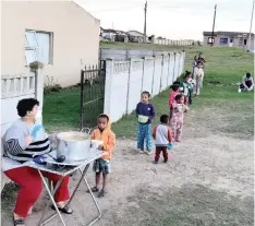  ??  ?? PACALTSDOR­P resident Rosa Louw and her family have stepped in at a local soup kitchen where the owner is at risk and cannot manage on her own.