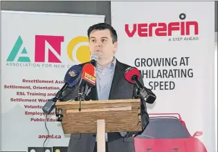  ?? ASHLEY FITZPATRIC­K/ THE TELEGRAM ?? Verafin co-founder Brendan Brothers offers a welcome at the launch of the province’s new immigratio­n plan, held at the Verafin office off of Hebron Way in St. John’s Friday. Minister Gerry Byrne pointed to Verafin as a company active in bringing...