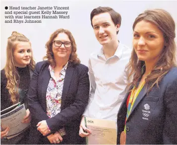  ??  ?? Head teacher Janette Vincent and special guest Kelly Massey with star learners Hannah Ward and Rhys Johnson