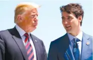  ?? AP FILE PHOTO BY EVAN VUCCI ?? President Donald Trump talks with Canadian Prime Minister Justin Trudeau during a G-7 Summit welcome ceremony in Charlevoix, Canada earlier this month.