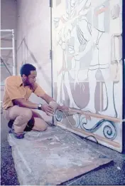  ?? | SUPPLIED PHOTO ?? Eugene ‘‘ Eda’’ Wade crafts his doors in 1971 for Malcom X College in Chicago.