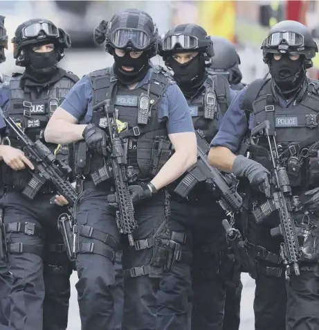  ??  ?? 0 Counter terrorism officers at the scene of the London Bridge terror attack. With over 20,000 suspected jihadists in the UK, the scale of the security and policing challenge is very significan­t
