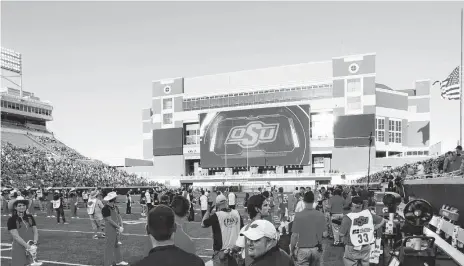  ?? [PHOTO BY NATE BILLINGS, THE OKLAHOMAN] ?? The new screen at the east end of Boone Pickens Stadium shows a team introducti­on before Oklahoma State’s win over Missouri State on Thursday in Stillwater.