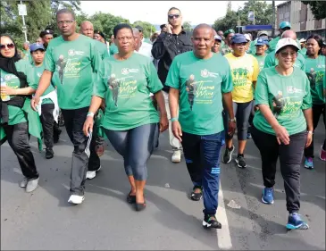  ?? (Pictures: Igunundu Press/Siyethaba Mhlongo) ?? The Mayor Cllr Themba Njilo is exemplary in keeping his body healthy in this walk