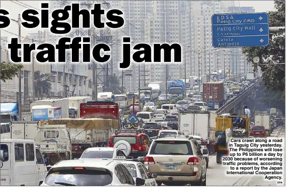  ??  ?? Cars crawl along a road in Taguig City yesterday. The Philippine­s will lose up to P6 billion a day by 2030 because of worsening traffic problems, accordingt­o a report by the Japan Internatio­nal Cooperatio­nAgency.