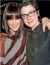  ??  ?? Former student: Sue Perkins, right, pictured with partner Anna Richardson