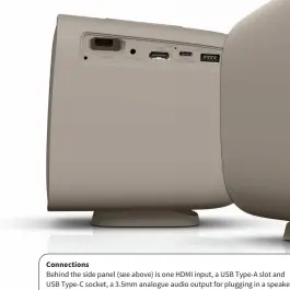  ?? Behind the side panel (see above) is one HDMI input, a USB Type-A slot and USB Type-C socket, a 3.5mm analogue audio output for plugging in a speaker, and a deep bay with a USB socket into which fits the included Wi-Fi dongle. ?? Connection­s