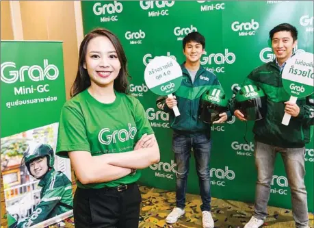  ??  ?? Grab Thailand, led by head of Bike-Hailing Operations Maythinee Anavachkul, introduced a new business model, Mini-Grab Centre or ‘Mini-GC’, offering business opportunit­ies for Thai micro-entreprene­urs and MSMEs.