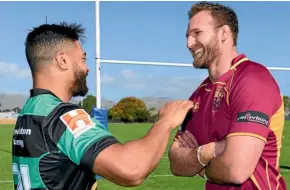  ??  ?? Richie Mo’unga and Kieran Read chat before yesterday’s match.