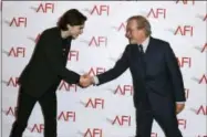  ?? PHOTO BY JORDAN STRAUSS — INVISION — AP ?? Timothee Chalamet and Steven Spielberg arrive at the 2018AFI Awards at the Four Seasons on Friday in Los Angeles.