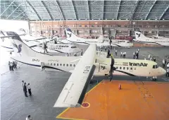  ?? TASNIM NEWS AGENCY VIA AP ?? In this photo provided by Tasnim News Agency, IranAir’s new commercial aircraft are parked at Mehrabad airport in Tehran on Sunday.