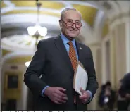  ?? (AP/J. Scott Applewhite) ?? Senate Majority Leader Chuck Schumer, D-N.Y., and the Democratic leadership meet with reporters Tuesday following a closeddoor strategy session at the Capitol in Washington.