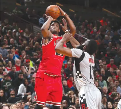  ?? | GARY DINEEN/GETTY IMAGES ?? Jimmy Butler had 24 points and 11 rebounds Saturday against the Houston Rockets at the United Center.