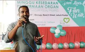  ?? PIC BY MIKAIL ONG ?? A. Tiruna Garasu speaking about his son’s organ donation in George Town yesterday.