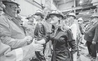  ?? GARY YOKOYAMA THE HAMILTON SPECTATOR ?? Freeland greets Stelco employees at the plant. The steelmaker called the measures “vital to protect jobs.”