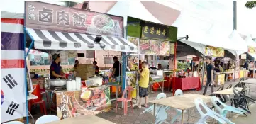  ??  ?? Photo shows some of the food stalls at the fair.