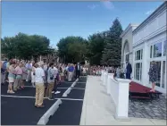  ?? PHOTO PROVIDED ?? Tyler Herrick, general manager of The Queensbury Hotel, speaks at a ribbon cutting ceremony.