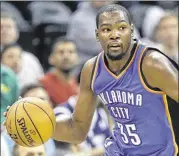  ?? RICK BOWMER / AP ?? Returning from a broken right foot that required three surgeries, Thunder forward Kevin Durant has grown weary of answering questions about his readiness.