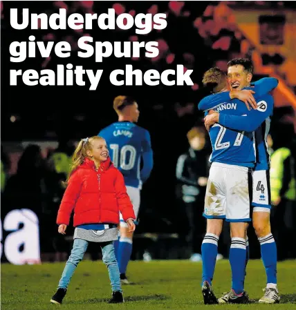  ?? Picture / Photosport ?? Rochdale’s surprise draw was enjoyed by players Jim McNulty and Andrew Cannon . . . and fan.