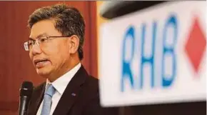  ??  ?? RHB Banking Group managing director Datuk Khairussal­eh Ramli says government agencies and industry players must work together to build a strong foundation in digital adoption.