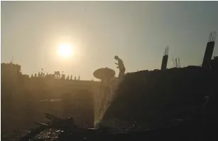  ??  ?? A PALESTINIA­N man walks through the rubble of a house in Gaza City during 2014’s Operation Protective Edge that was said to have been destroyed in Israeli air strikes.