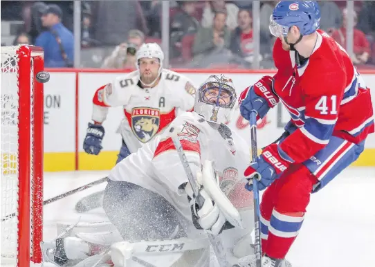  ?? JOHN MAHONEY ?? Canadiens forward Paul Byron watches the puck sail over Panthers goalie Roberto Luongo for his first of two goals Friday night at the Bell Centre.