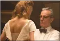  ??  ?? Vicky Krieps, left, and Daniel Day-Lewis appear in a scene from “Phantom Thread.”