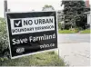  ?? JOHN RENNISON THE HAMILTON SPECTATOR ?? More than 1,000 Stop Sprawl signs have popped up on lawns.